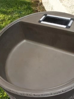 Round Rain Barrel With Planter, 35 Gallons 9 Round Rain Barrel With Planter, 35 Gallons -Outdoor Garden Care Shop 8612856WALNT 02V tif